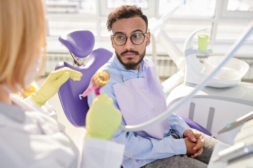 Young Patient Waiting for dental emergency Procedure